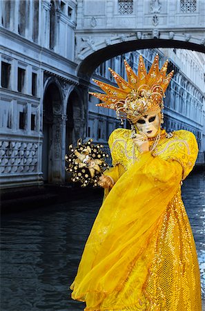 elaborate - Masked figure in costume at the 2012 Carnival, with Ponte di Sospiri in the background, Venice, Veneto, Italy, Europe Stock Photo - Rights-Managed, Code: 841-06030938