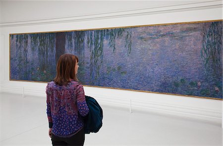 Lady looking at Monet's Water Lilies in the Orangerie Gallery, Paris, France, Europe Stock Photo - Rights-Managed, Code: 841-06031214
