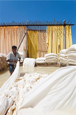 Washing fabric in a bleaching pool, Sari garment factory, Rajasthan, India, Asia Stock Photo - Rights-Managed, Code: 841-06031285