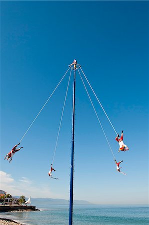 pole dancing images - Voladores of Papantla flying men, on the Malecon, Puerto Vallarta, Jalisco, Mexico, North America Stock Photo - Rights-Managed, Code: 841-06031494