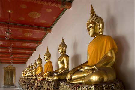simsearch:841-06033289,k - Sitting Buddhas, Wat Pho (Reclining Buddha Temple), (Wat Phra Chetuphon), Bangkok, Thailand, Southeast Asia, Asia Stock Photo - Rights-Managed, Code: 841-06031607