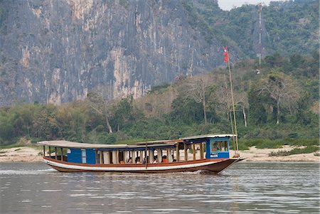 simsearch:862-07690392,k - River boat on the Mekong River, Luang Prabang, Laos, Indochina, Southeast Asia, Asia Foto de stock - Con derechos protegidos, Código: 841-06031664