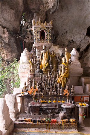 simsearch:841-05796458,k - Buddhist shrine, Pak Ou Buddha Caves, near Luang Prabang, Laos, Indochina, Southeast Asia, Asia Stock Photo - Rights-Managed, Code: 841-06031667