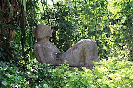 envahi par la végétation - Statue de Chacmool, Parc National Chankanaab, île de Cozumel (Isla de Cozumel), Quintana Roo, Mexique, Caraïbes, Amérique du Nord Photographie de stock - Rights-Managed, Code: 841-06031849
