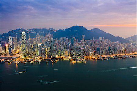 Cityscape of Hong Kong Island skyline at sunset, Hong Kong, China, Asia Foto de stock - Direito Controlado, Número: 841-06032008