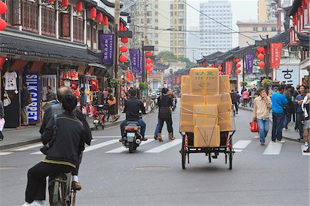 simsearch:841-05846167,k - Pedestrians and traffic on Shanghai Old Street, a restored traditional neighbourhood, Nanshi, Shanghai, China, Asia Stock Photo - Rights-Managed, Code: 841-06032002