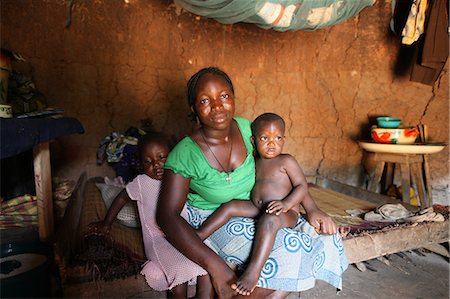 Woman and children in an African hut, Tori, Benin, West Africa, Africa Stock Photo - Rights-Managed, Code: 841-06032061