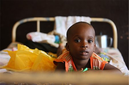 Young patient in an African hospital, Lome, Togo, West Africa, Africa Foto de stock - Con derechos protegidos, Código: 841-06032320