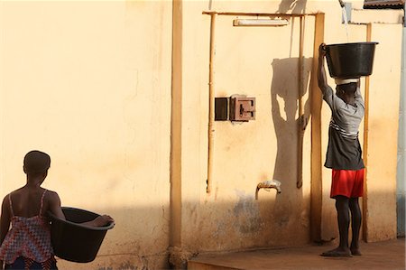 simsearch:841-06032421,k - Woman carrying water, Lome, Togo, West Africa, Africa Foto de stock - Con derechos protegidos, Código: 841-06032414