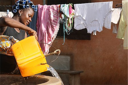 portrait outside work water - Water well in Africa, Lome, Togo, West Africa, Africa Stock Photo - Rights-Managed, Code: 841-06032413