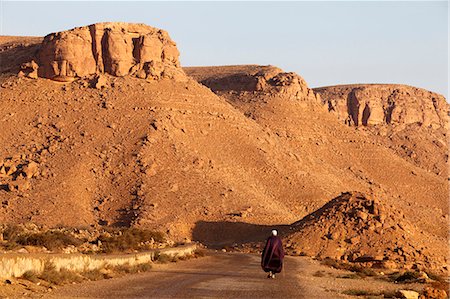 road rocks photo - Man walking on the Chenini village road, Tunisia, North Africa, Africa Stock Photo - Rights-Managed, Code: 841-06032480