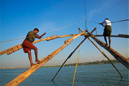 fisherman asian - Chinese fishing nets, Fort Cochin (Kochi), Kerala, India, Asia Stock Photo - Rights-Managed, Code: 841-06032952