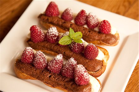 foods for culture european - Chocolate eclairs topped with raspberries, French cafe, France, Europe Stock Photo - Rights-Managed, Code: 841-06033131