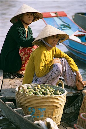 southeast asia traditional clothing - Floating market, Can Tho, Mekong Delta, Vietnam, Indochina, Southeast Asia, Asia Stock Photo - Rights-Managed, Code: 841-06033269