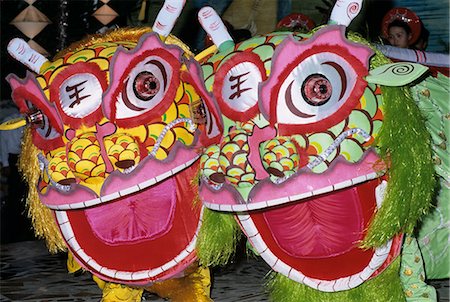 Chinese dragon dance at Chinese New Year celebrations, Vietnam, Indochina, Southeast Asia, Asia Stock Photo - Rights-Managed, Code: 841-06033261