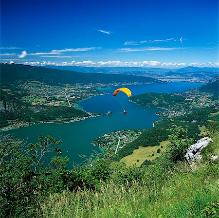 paragliders - View over lake with paraglider, Lake Annecy, Rhone Alpes, France, Europe Foto de stock - Con derechos protegidos, Código: 841-06033482