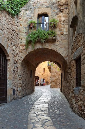 stone archways exterior - Street scene in old town, Pals, Costa Brava, Catalonia, Spain, Europe Stock Photo - Rights-Managed, Code: 841-06033674