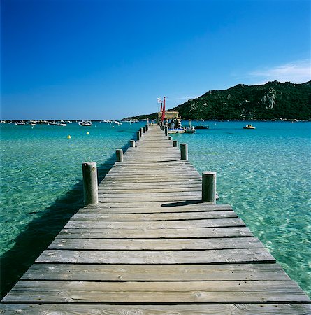 Pier et la baie, la Plage de Santa Giulia, South East Corse, Corse, Méditerranée, Europe Photographie de stock - Rights-Managed, Code: 841-06033734