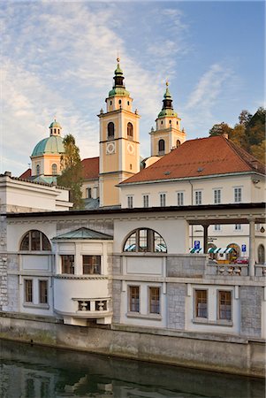 Riverside market halls and the Cathedral of St. Nicholas on the Ljubljanica River, Ljubljana, Slovenia, Europe Stock Photo - Rights-Managed, Code: 841-06033777