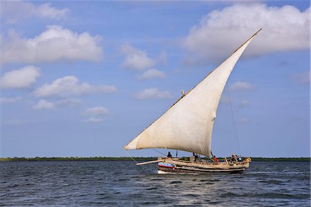 dhow boat - A traditional dhow boat sailing off the coast of Lamu, Kenya, East Africa, Africa Stock Photo - Rights-Managed, Code: 841-06033806