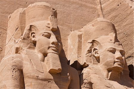 Giant heads of Ramesses II at the Temple of Re-Herakhte at Abu Simbel, UNESCO World Heritage Site, Nubia, Egypt, North Africa, Africa Fotografie stock - Rights-Managed, Codice: 841-06033852