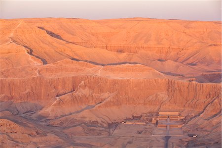 Aerial view from hot air balloon of Hatshepsut's Mortuary Temple at sunrise, Deir el-Bahri, Thebes, UNESCO World Heritage Site, Egypt, North Africa, Africa Stock Photo - Rights-Managed, Code: 841-06033878