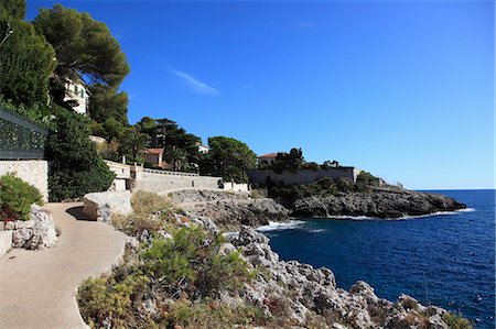 french riviera - Coastal Path, Cap d'Ail, Cote d'Azur, Provence, French Riviera, Mediterranean, France, Europe Foto de stock - Direito Controlado, Número: 841-06344034