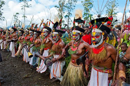 facial decoration - Colourfully dressed and face painted local tribes celebrating the traditional Sing Sing in the Highlands of Papua New Guinea, Pacific Stock Photo - Rights-Managed, Code: 841-06344101