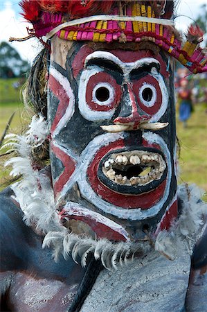 simsearch:841-06344088,k - Colourfully dressed and face painted local tribes celebrating the traditional Sing Sing in the Highlands of Papua New Guinea, Pacific Stock Photo - Rights-Managed, Code: 841-06344103