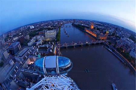 View of passenger pod capsule, Houses of Parliament, Big Ben and the River Thames from the London Eye at dusk, London, England, United Kingdom, Europe Stock Photo - Rights-Managed, Code: 841-06344312