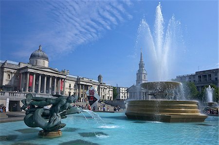 Tritons and dolphin fountain with the Olympic digital countdown clock and the National Gallery, Trafalgar Square, London, England, United Kingdom, Europe Fotografie stock - Rights-Managed, Codice: 841-06344313