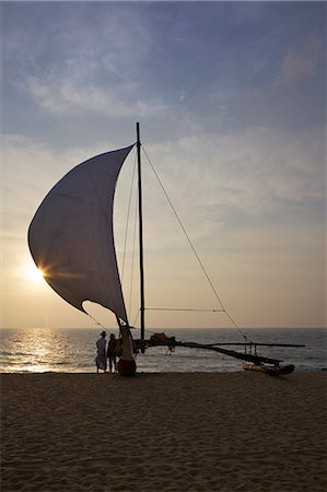 sailing beach - Fisherman and Oruvas (traditional outrigger dug-out canoe), on Negombo beach, Sri Lanka, Asia Stock Photo - Rights-Managed, Code: 841-06344367