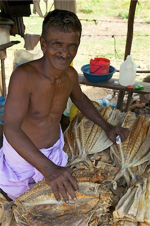 Market stall holder selling dried fish, Nilaveli, Trincomalee, Sri Lanka, Asia Foto de stock - Con derechos protegidos, Código: 841-06344393