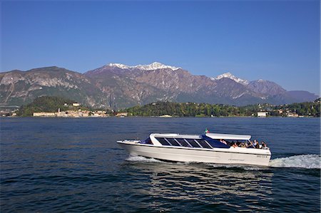 simsearch:841-06344529,k - Pleasure boat crossing Lake Como from Bellagio in spring sunshine, Lombardy, Italian Lakes, Italy, Europe Foto de stock - Con derechos protegidos, Código: 841-06344530