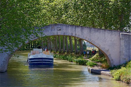 france barging - Navigation on the Canal du Midi, UNESCO World Heritage Site, between Carcassonne and Beziers, Aude, Languedoc Roussillon, France, Europe Stock Photo - Rights-Managed, Code: 841-06344556