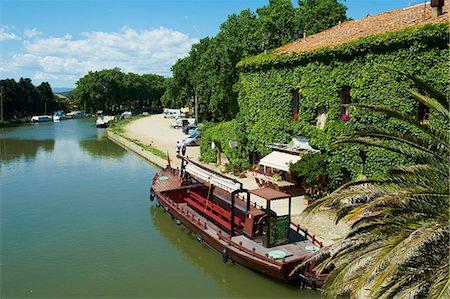 Barge for tourists, Le Somail, Navigation on the Canal du Midi, between Carcassone and Beziers UNESCO World Heritage Site, Aude, Languedoc Roussillon, France, Europe Foto de stock - Con derechos protegidos, Código: 841-06344576