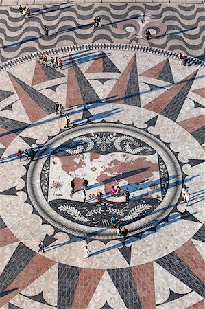 people aerial shot city - Pavement map showing routes of Portugese explorers below Monument to the Discoveries, Belem, Lisbon, Portugal, Europe Stock Photo - Rights-Managed, Code: 841-06345269