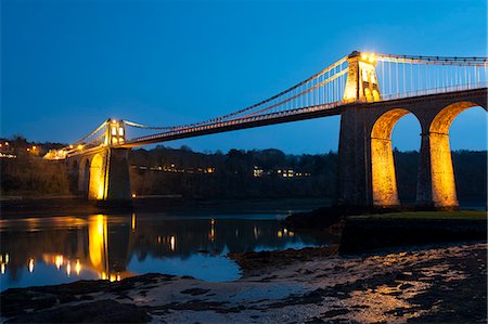 Menai Bridge illuminated at dusk, Gwynedd, Anglesey, North Wales, Wales, United Kingdom, Europe Stock Photo - Rights-Managed, Code: 841-06345337