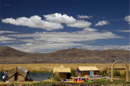 simsearch:841-07782368,k - Floating islands of the Uros people, traditional reed boats and reed houses, Lake Titicaca, peru, peruvian, south america, south american, latin america, latin american South America Stock Photo - Rights-Managed, Code: 841-06345449