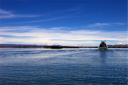 peru lake - Boat on Lake Titicaca, peru, peruvian, south america, south american, latin america, latin american South America Stock Photo - Rights-Managed, Code: 841-06345451