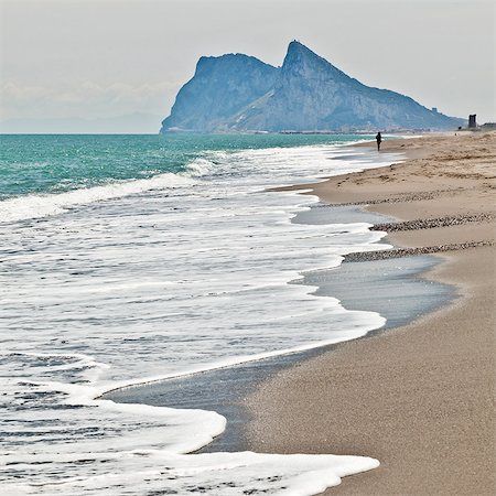 simsearch:841-06445111,k - Tourist walking toward Gibraltar, Alcaidesa beach, near Sotogrande, Andalucia, Spain, Europe Stock Photo - Rights-Managed, Code: 841-06340863