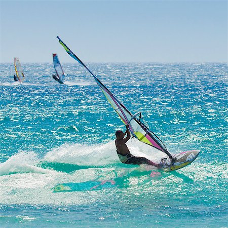 Windsurfer riding wave, Bonlonia, near Tarifa, Costa de la Luz, Andalucia, Spain, Europe Stock Photo - Rights-Managed, Code: 841-06340885