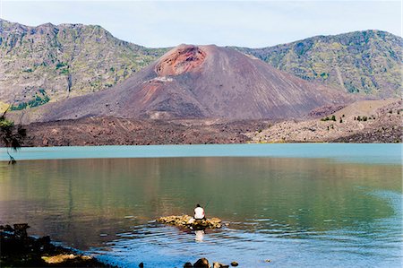 simsearch:841-06341198,k - Man fishing in front of Mount Baru Jari, Segara Anak Lake at the bottom of Mount Rinjani volcano crater, Lombok, Indonesia, Southeast Asia, Asia Stock Photo - Rights-Managed, Code: 841-06341154