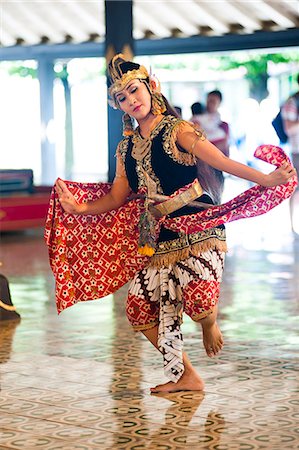 Woman performing a traditional Javanese palace dance at The Sultan's Palace (Kraton), Yogyakarta, Java, Indonesia, Southeast Asia, Asia Stock Photo - Rights-Managed, Code: 841-06341191