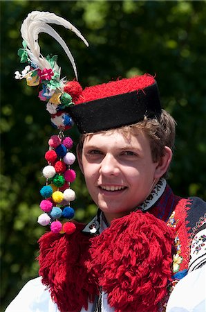 feathers europe - Young man wearing folk dress during festival The Ride of the Kings, Vlcnov, Zlinsko, Czech Republic, Europe Stock Photo - Rights-Managed, Code: 841-06342112