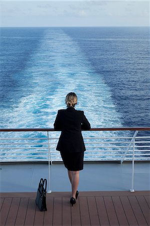 escape - Business woman on a cruise ship, Nassau, Bahamas, West Indies, Caribbean, Central America Stock Photo - Rights-Managed, Code: 841-06342792