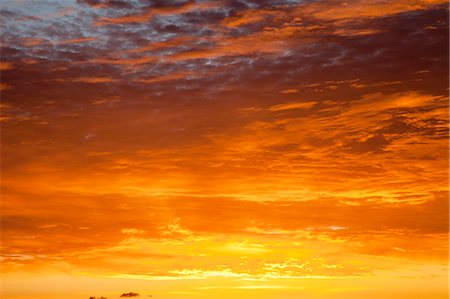 simsearch:841-06342803,k - Red sky at sunrise over Atlantic Ocean, view from Miami Beach, Florida, United States of America, North America Fotografie stock - Rights-Managed, Codice: 841-06342842