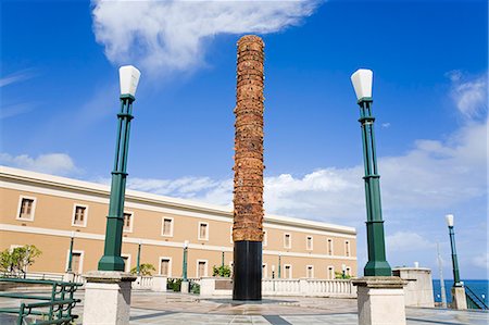 Totem Pole sculpture in Quincentennial Square, Old City of San Juan, Puerto Rico Island, West Indies, United States of America, Central America Stock Photo - Rights-Managed, Code: 841-06343046