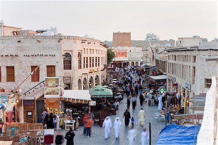 street fair - The restored Souq Waqif with mud rendered shops and exposed timber beams, Doha, Qatar, Middle East Stock Photo - Rights-Managed, Code: 841-06343068