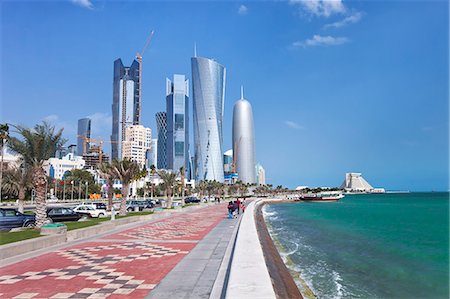 qatar - View along the Corniche towards the new skyline of the West Bay central financial district, Doha, Qatar, Middle East Stock Photo - Rights-Managed, Code: 841-06343080